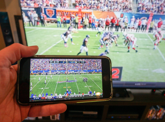 But fans nowadays can watch NFL games on Firestick through IPTV services, streaming apps, add-ons, or sports streaming sites." width="350" height="259" srcset="https://iptvknowledge.com/wp-content/uploads/2023/09/watch-nfl-games-on-firestick-16.png 571w, https://iptvknowledge.com/wp-content/uploads/2023/09/1_watch-nfl-games-on-firestick-16-300x222.png 300w" sizes="(max-width: 350px) 100vw, 350px" /></p>
<p>The following is a compilation of the finest options for watching NFL matches on the Amazon Firestick, Fire TV, or any other streaming gadget. These options are also compatible with Android TV gadgets, Roku, Chromecast with Google TV, Android TV boxes, PCs, phones, tablets, and IPTV boxes.</p>
<p><img decoding="async" loading="lazy" class="alignnone wp-image-21600" src="https://iptvknowledge.com/wp-content/uploads/2023/09/watch-nfl-games-on-firestick-1.jpg" alt=